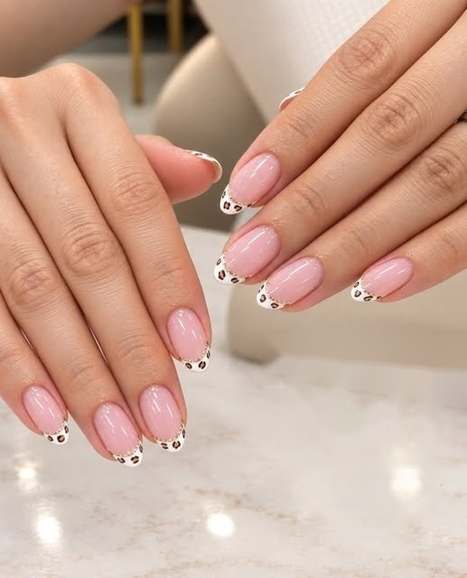 Natural almond nails with dotted French tips