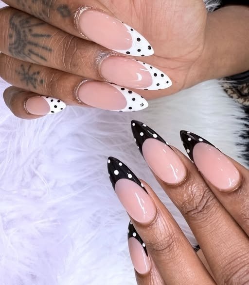 Stiletto acrylic nails with polka-dot French tips